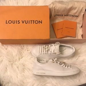 Pair of white louis vuitton leather low-top shoes